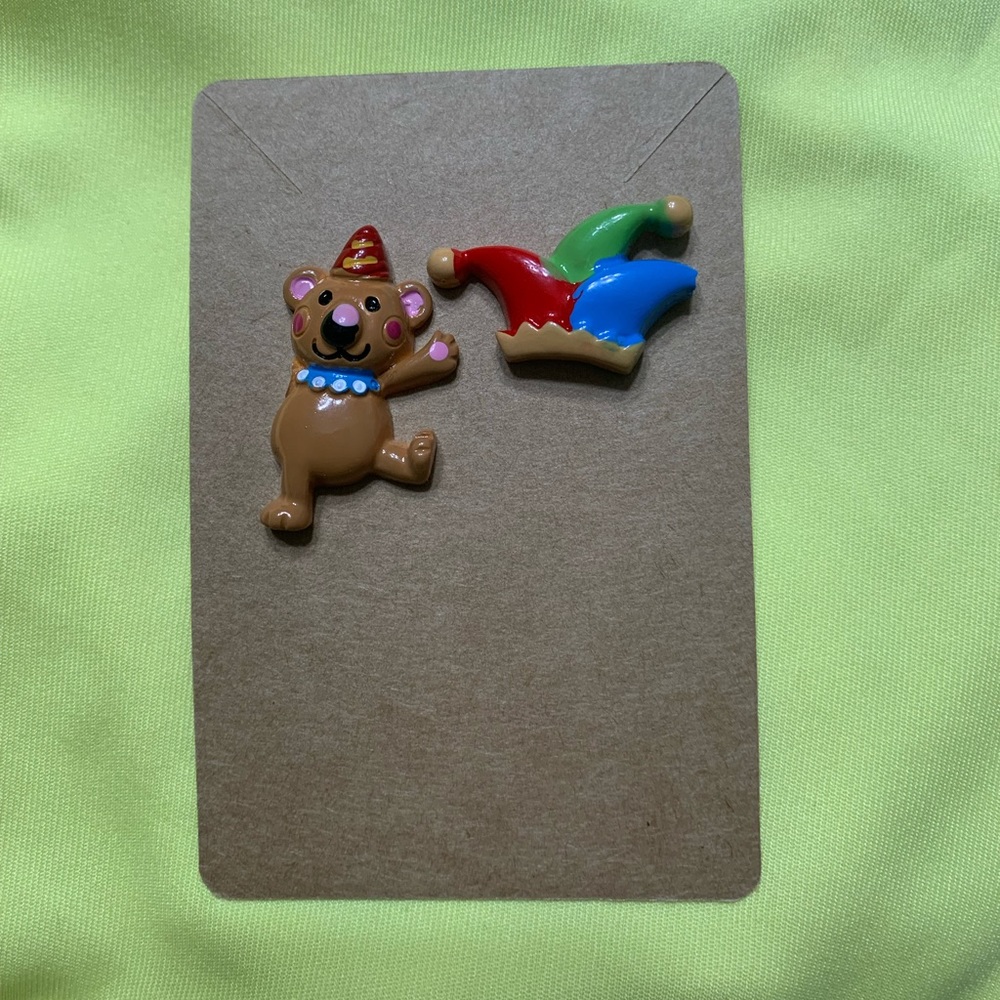 Asymmetrical bear & jester cap earrings